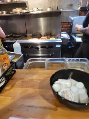 Sit at the bar and watch the grill at Roasted in Bethlehem