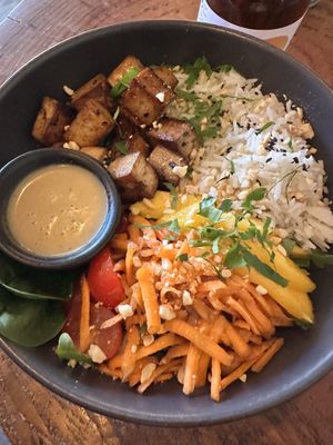 Rice bowl with peanut sauce   at Apuro Vegan Bar in Porto