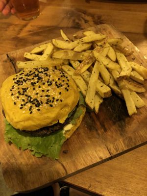 Black bean burger with fries at Apuro Vegan Bar in Porto