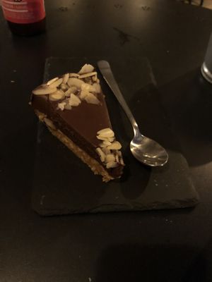 Chocolate almond tarte with no sugar. Deeelicious!  at Apuro Vegan Bar in Porto