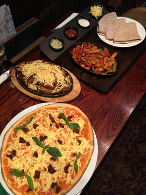 Vegan pizza and fajitas with poutine  at Ivy House in Sunderland