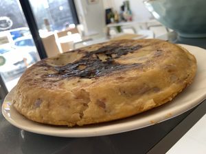 Tortilla (chickpeas) with potatoes and o io S at Come a Casa in Milan