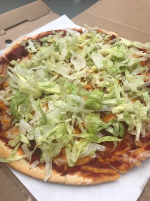 Taco Pizza- Soy chorizo to give this pizza a nice kick, with Daiya cheddar and a dash of Daiya mozzarella and topped off with lettuce. at Jake's Stadium Pizza in Mankato