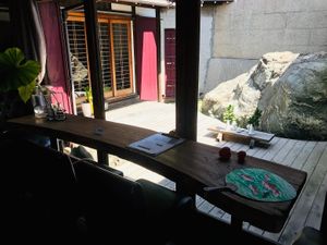 interior with nice view of the outside deck at TSUNAGORO in Yokohama