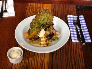 Creamy pumpkin risotto plus wood oven grilled veggies at Glória Bistrô in Ouro Preto