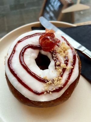 Cherry Bakewell doughnut   at Perk Cafe in Inverness
