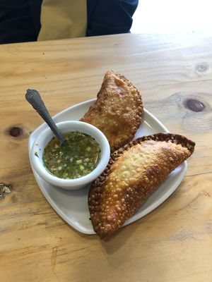 Empanadas veganas, una de garbanzos y la otra de arroz, quinua, arberjas y soya at Vegan'us Cocina Feliz - Puente Aranda in Bogota