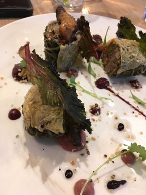 Roasted and pickled veggies in cabbage rolls with crispy kale at L'Orygine in Quebec