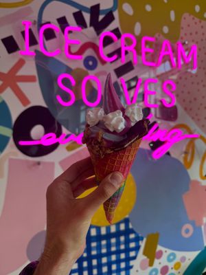 very colorful flavors, plus vegan toppings (whipped cream, peanut butter bark, and cookie dough) at MN Nice Cream in Minneapolis