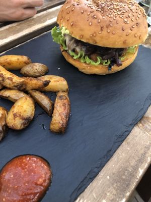 Black bean burger with vegan cheese:P at Laundry Lounge in Sagres