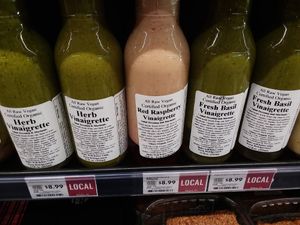 Raw vegan dressings in the refrigerated raw food section near produce. at Whole Foods Market in Naples