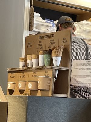 The cheapest holds two scoops and then it’s three, four and five which the maxi one holds.   at Gelateria La Romana in Rome