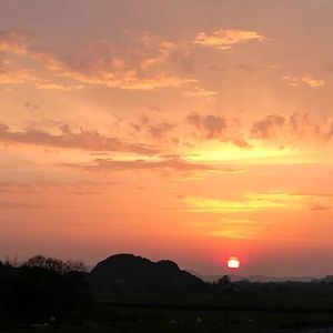 Watch the sunset over Dunadd Hill at Kings Reach Self Catering in Lochgilphead