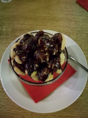 Fried dough balls with vegan chocolate sauce at Noi Quattro Pizzeria in Manchester