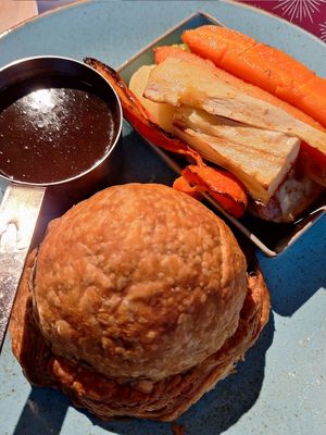 Vegan Wellington with roasted vegetables and potatoes at The Anthologist - St Peters Square in Manchester
