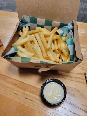 the fries look a lot better than they were. Mealy, greasy,dry. Garlic sauce is toume that they've sucked the life out of.  Flavorless, mostly oil. at MSP - Holy Land - T1 in Minneapolis