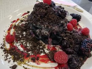 Black spooky pancakes, berries, Oreos, cream at Rawnchy in Glasgow