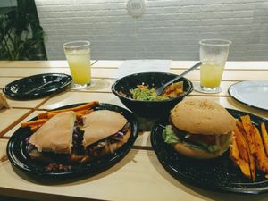 Ultra Special Beyond Burger & BBQ Torta w/ Sweet Potato Fries and Nachos. at Once Once Cocina Compasion in Mazatlan