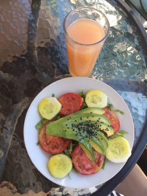 Papaya juice and avocado salad  at Prana Vegan in Arequipa