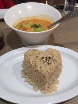 Yellow vegetable curry with brown rice at Plumeria in Encinitas