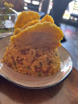Yellow rice, pink beans and tostones   at Cafe Berlin in San Juan