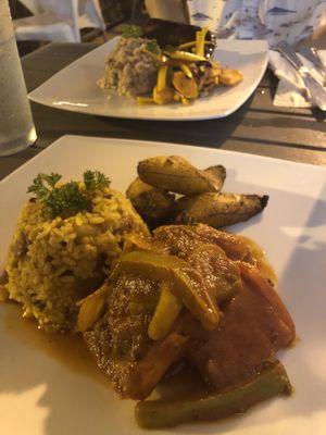 Criollo Tofu w plantains (in front) & guava loaf w malanga at Cafe Berlin in San Juan