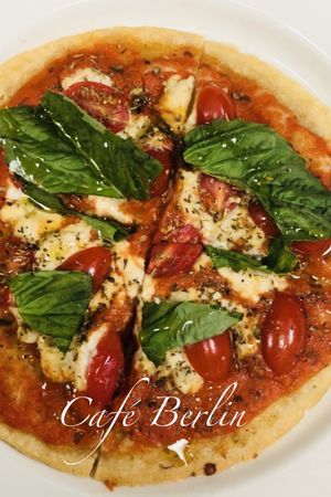 Vegan & Gluten free Pita Pizza!
With marinara sauce, cherry tomatoes, cheese and fresh basil! at Cafe Berlin in San Juan