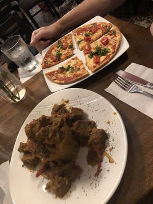 Mofongo and vegan margherita pizza  at Cafe Berlin in San Juan
