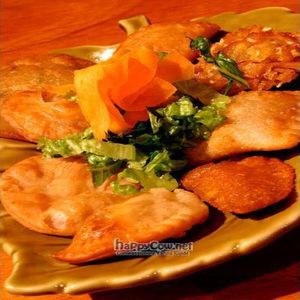 Puerto Rican Favorites like; alcapurrias, bacalaitos, arepas de coco and more... at Cafe Berlin in San Juan