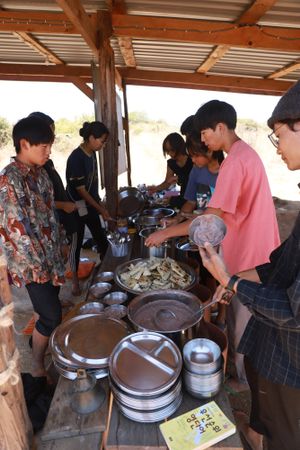 Depending on how many people are participating, food may be served in the kitchen or in the main hut.   at Sadhana Forest in Maralal