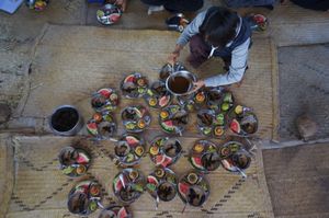 Breakfast plates ready to be served.   at Sadhana Forest in Maralal