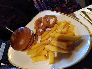 Vegan burger with chips and onion rings (January 2025) at The Starling Cloud in Aberystwyth