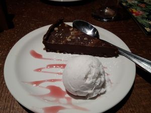 chocolate cheese cake with vanilla ice cream at The Starling Cloud in Aberystwyth