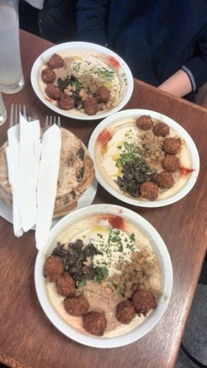Complete hummus plates at Hummus Bar Vegetarian in Budapest