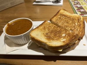 Vegan beet Reuben sandwich with (tomato kale) soup of the day  at Snakes & Lattes - Bloor St in Toronto