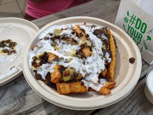 Bacon Shroom Fries w bleu cheese dressing. at Next Level Burger - Austin in Austin