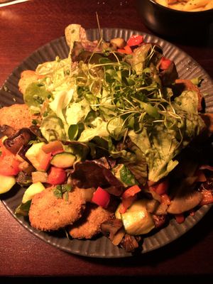Big salad with grilled veggies and falafel Patties  at Bonnie & Clyde in Stuttgart