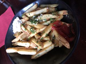 Fries with herbs, garlic, ketchup and vegan mayo  at Bonnie & Clyde in Stuttgart