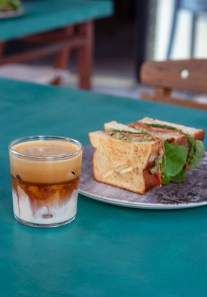 Vegan bacon sandwich and iced flat white  at Avit in Athens