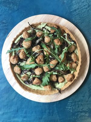 Avocado, mushroom, vegan mozzarella tart at Avit in Athens