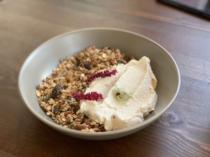 Homemade granola with dried fruit and homemade cashew yogurt... creamy, not to sweet... Delicious combination of textures!  at Avit in Athens