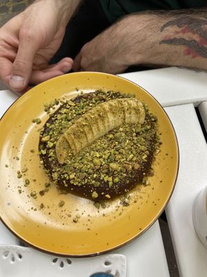 Other half of the pancake portion. This one topped with home made nutella, banana and pistachio sprinkles  at Ćao Šećeru in Belgrade