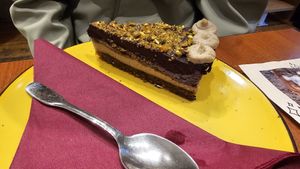 Blueberry pistaccio cake at Ćao Šećeru in Belgrade