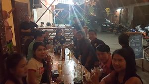 Big night with a Lao group joining for drinks at XangKhiaw Vvirtshaus in Thakhek