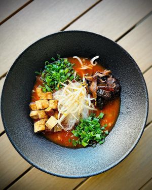 Zupa Kimchi z tofu, grzybami shitake, kiełkami i szczypiorkiem  at Vege Love in Warsaw