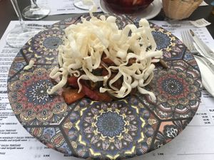 Wok of vegetables, rice noodles and teriyaki sauce at Gloria Bendita in Malaga