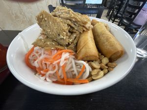 Bun - vermicelli with eggrolls, grilled and shredded pork.  at Veggie Life Restaurant in South El Monte