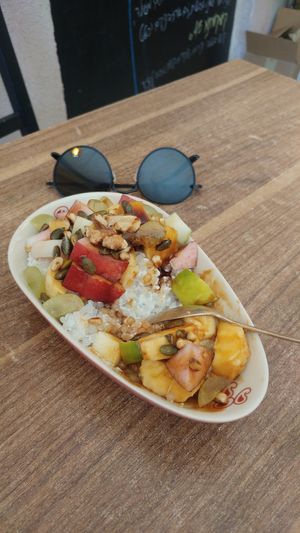 DELICIOUS coconut tapioca bowl with fresh fruit and date syrup at Shakti in Beer Sheva