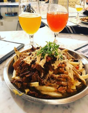 Fries and brew  at Modern Times Far West Lounge in Encinitas