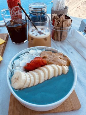 The mermaid bowl and an oat milk latte.    at Galini Cafe in Santorini